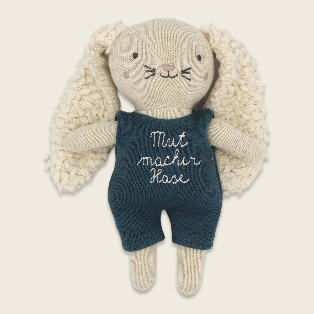Mutmacher-Hase mit blauem Anzug